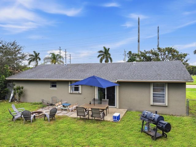 234 La Mancha Avenue, Royal Palm Beach, FL 33411