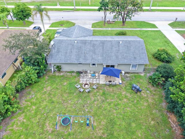234 La Mancha Avenue, Royal Palm Beach, FL 33411