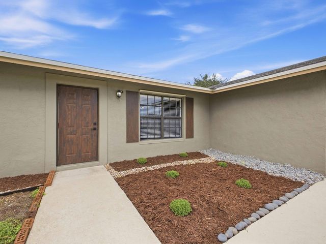 234 La Mancha Avenue, Royal Palm Beach, FL 33411