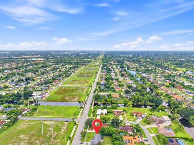234 La Mancha Avenue, Royal Palm Beach, FL 33411
