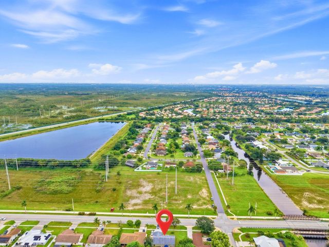 234 La Mancha Avenue, Royal Palm Beach, FL 33411