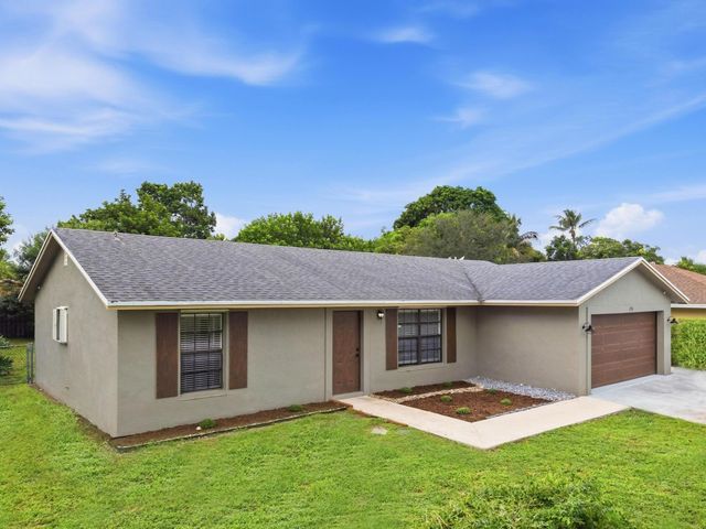 234 La Mancha Avenue, Royal Palm Beach, FL 33411