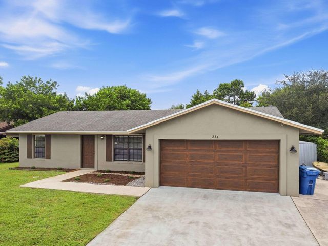 234 La Mancha Avenue, Royal Palm Beach, FL 33411