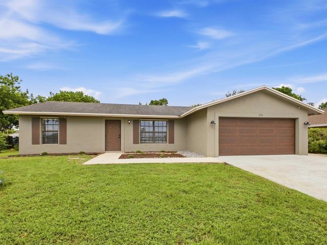 234 La Mancha Avenue, Royal Palm Beach, FL 33411