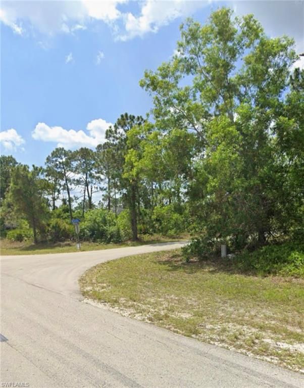 1036 NIMITZ BLVD, LEHIGH ACRES, FL 33974 — exterior