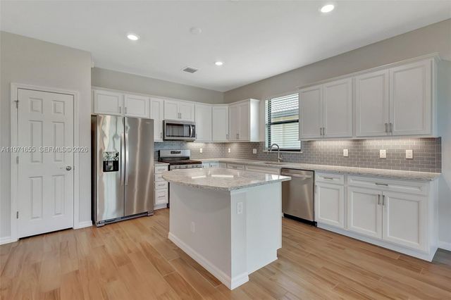 727 SE Boboli Way, Port St. Lucie, Port St Lucie, FL 34984