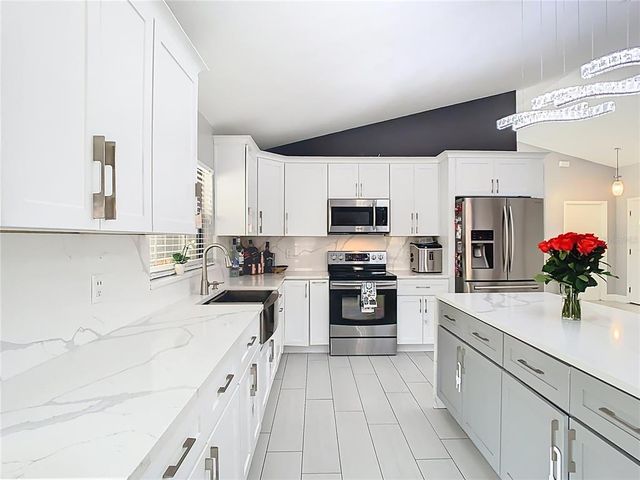 7974 VILLAGE GREEN ROAD, Orlando, FL 32818