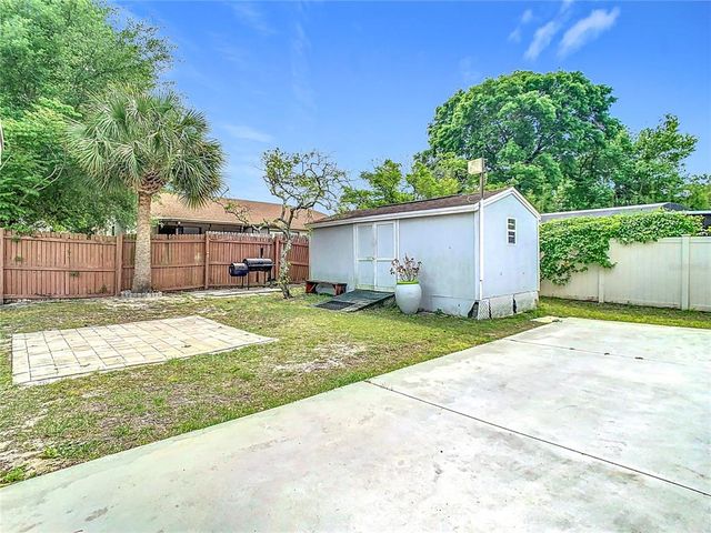 7974 VILLAGE GREEN ROAD, Orlando, FL 32818