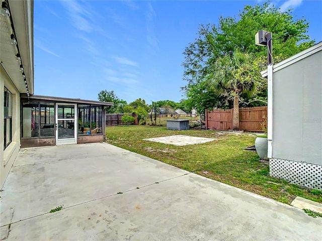 7974 VILLAGE GREEN ROAD, Orlando, FL 32818
