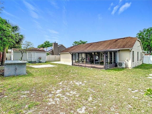 7974 VILLAGE GREEN ROAD, Orlando, FL 32818