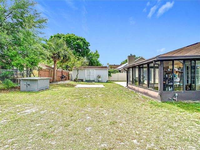 7974 VILLAGE GREEN ROAD, Orlando, FL 32818