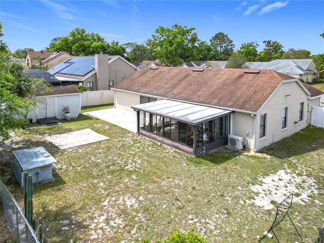 7974 VILLAGE GREEN ROAD, Orlando, FL 32818