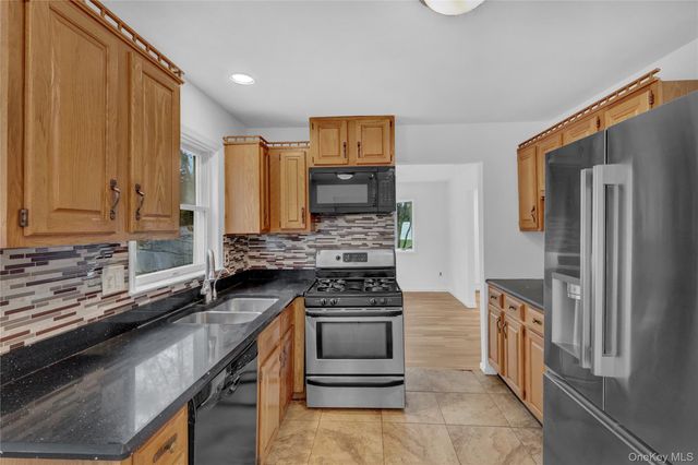 415 Pond Path, East Setauket, NY 11733