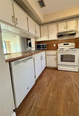 201 Lake Pointe Drive 202, Oakland Park, FL 33309