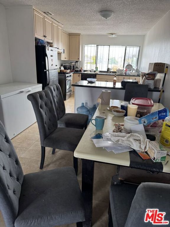 Image 4 of property listing at 3945 Denker Avenue, Los Angeles, CA 90062