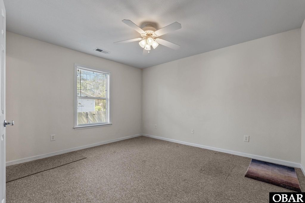 Image 13 of property listing at 718 N George Howe Street Lot 2, Manteo, NC 27954