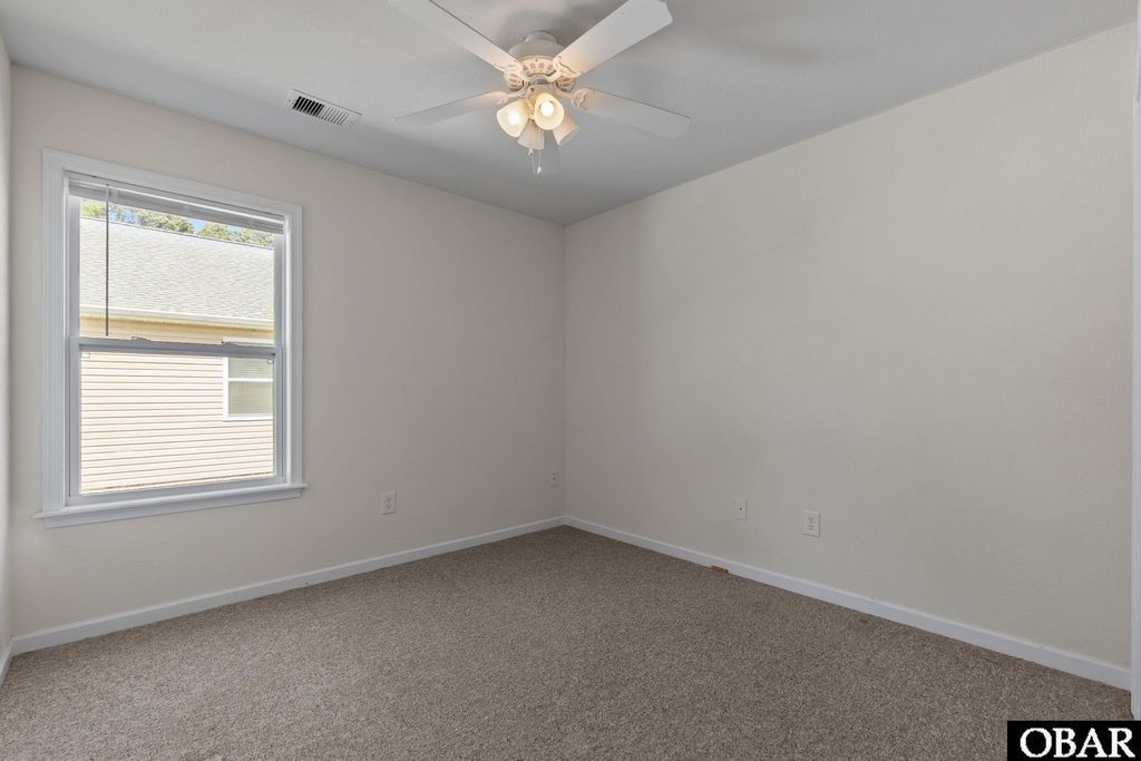 Image 21 of property listing at 718 N George Howe Street Lot 2, Manteo, NC 27954