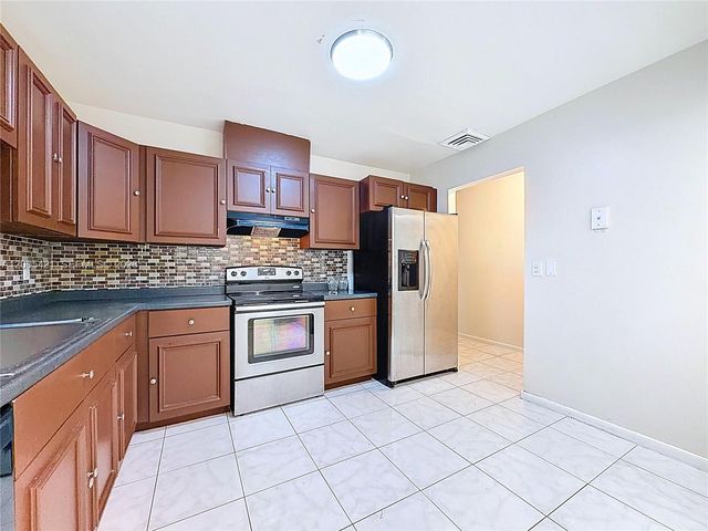 8900 W Sample Rd 202, Coral Springs, FL 33065
