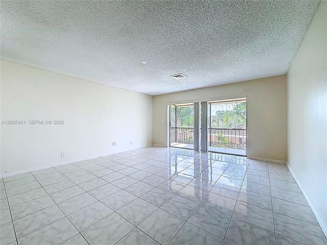 8900 W Sample Rd 202, Coral Springs, FL 33065
