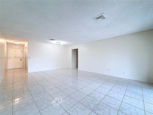 8900 W Sample Rd 202, Coral Springs, FL 33065