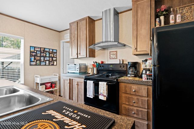 211 NE 76th Street, Oak Island, NC 28465