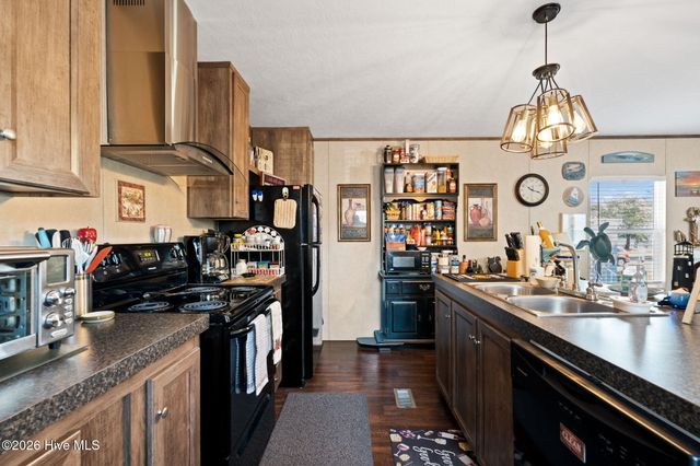 211 NE 76th Street, Oak Island, NC 28465