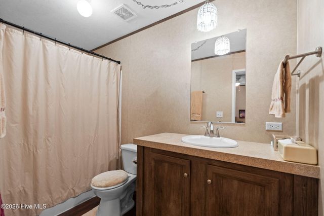 211 NE 76th Street, Oak Island, NC 28465