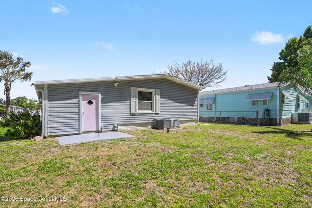 421 Papaya Circle, Barefoot Bay, FL 32976