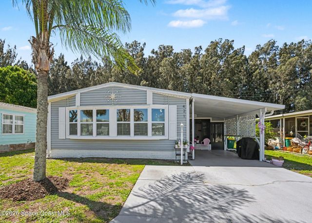 421 Papaya Circle, Barefoot Bay, FL 32976