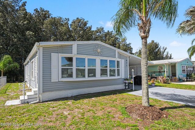 421 Papaya Circle, Barefoot Bay, FL 32976