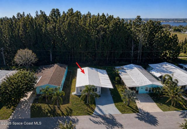 421 Papaya Circle, Barefoot Bay, FL 32976