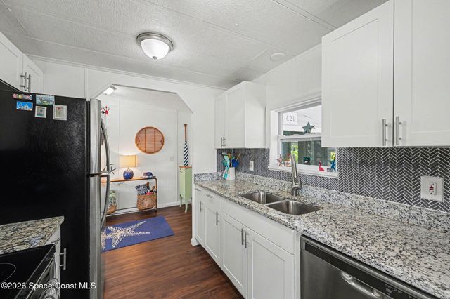 421 Papaya Circle, Barefoot Bay, FL 32976