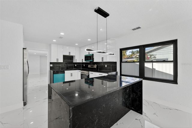 4712 E SERENA DRIVE, Tampa, FL 33617