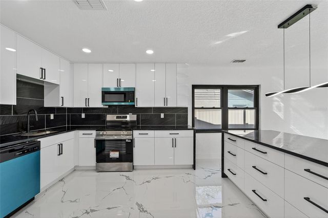 4712 E SERENA DRIVE, Tampa, FL 33617