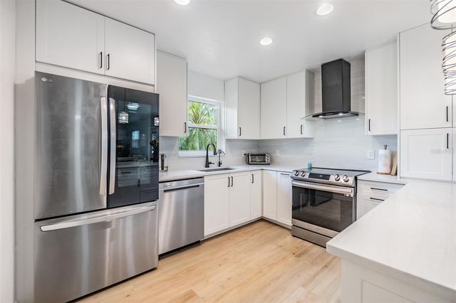 1400 TARPON WOODS BOULEVARD E4, Palm Harbor, FL 34685