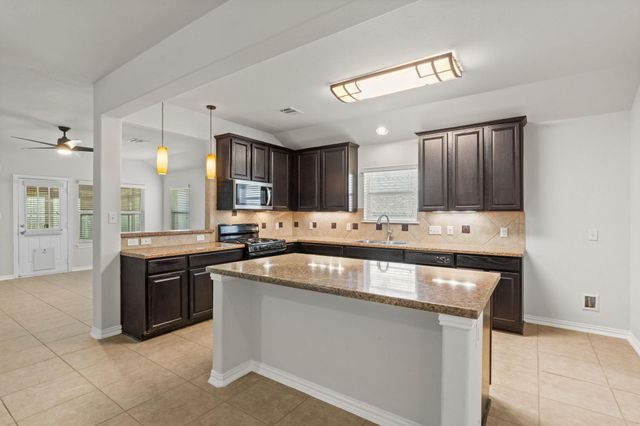 322 Strawberry Blonde DR, Buda, TX 78610