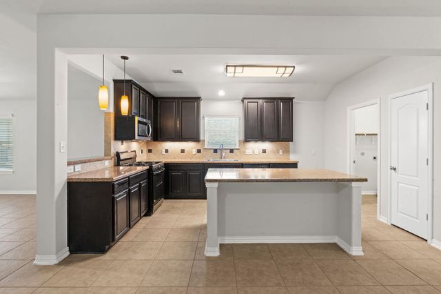 322 Strawberry Blonde DR, Buda, TX 78610