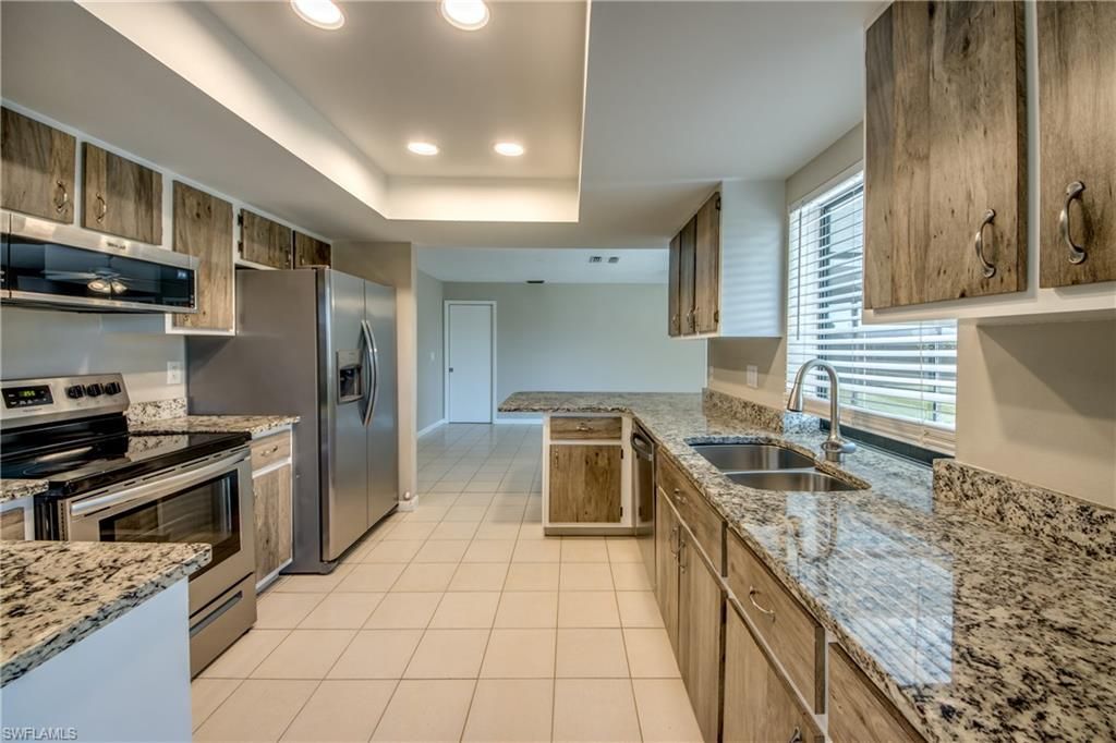 309 SE 17th AVE, CAPE CORAL, FL 33990 — photo 5