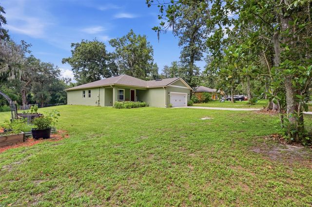 425 SPRING GARDEN AVENUE, De Leon Springs, FL 32130