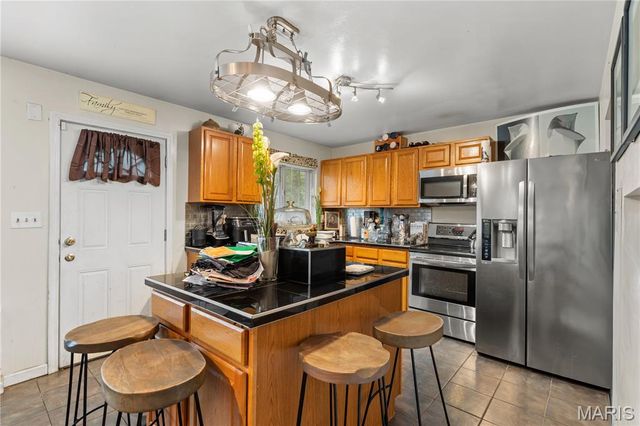 9823 Ventura Drive, Riverview, MO 63136