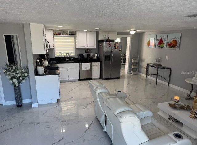 1248 BRIGHTWELL DRIVE, Holiday, FL 34690