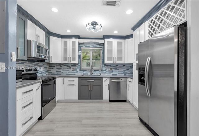 7911 SW 7th Place, North Lauderdale, FL 33068