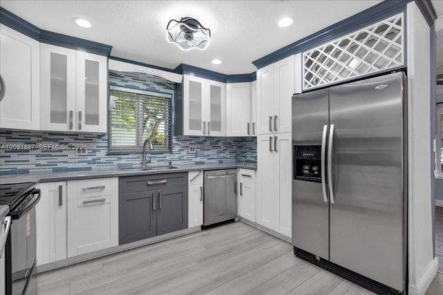 7911 SW 7th Place, North Lauderdale, FL 33068