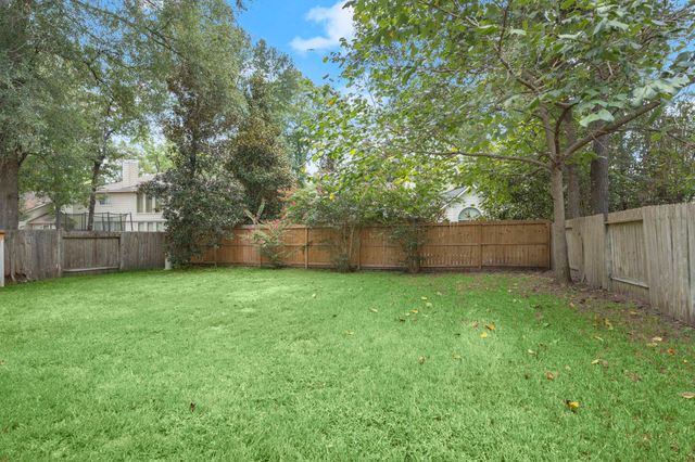 34 S Rambling Ridge Place, Conroe, TX 77385