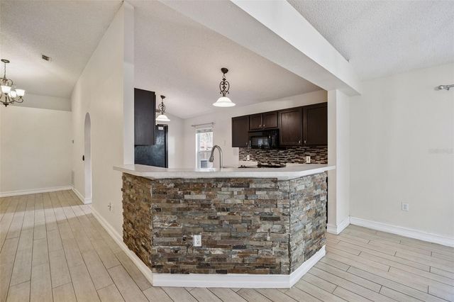 1612 MUIR CIRCLE, Clermont, FL 34711