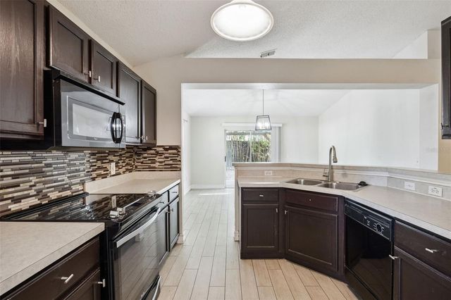 1612 MUIR CIRCLE, Clermont, FL 34711