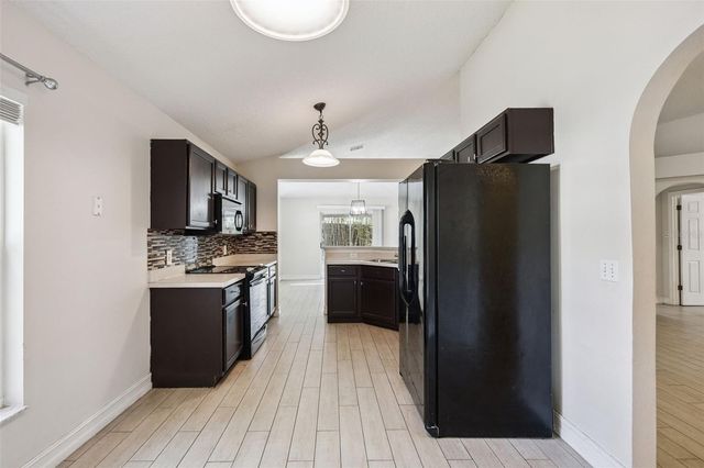 1612 MUIR CIRCLE, Clermont, FL 34711