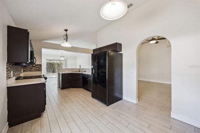 1612 MUIR CIRCLE, Clermont, FL 34711