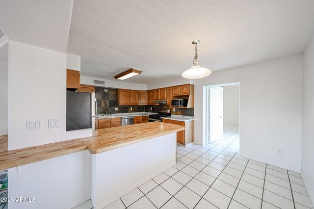 3408 W PORT AU PRINCE Lane, Phoenix, AZ 85053