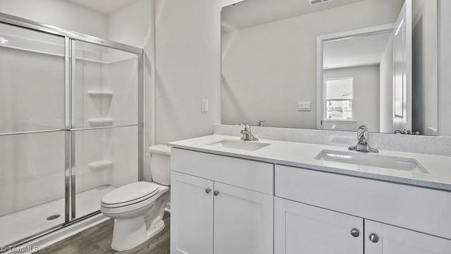 607 Ferio Court, Gibsonville, NC 27249